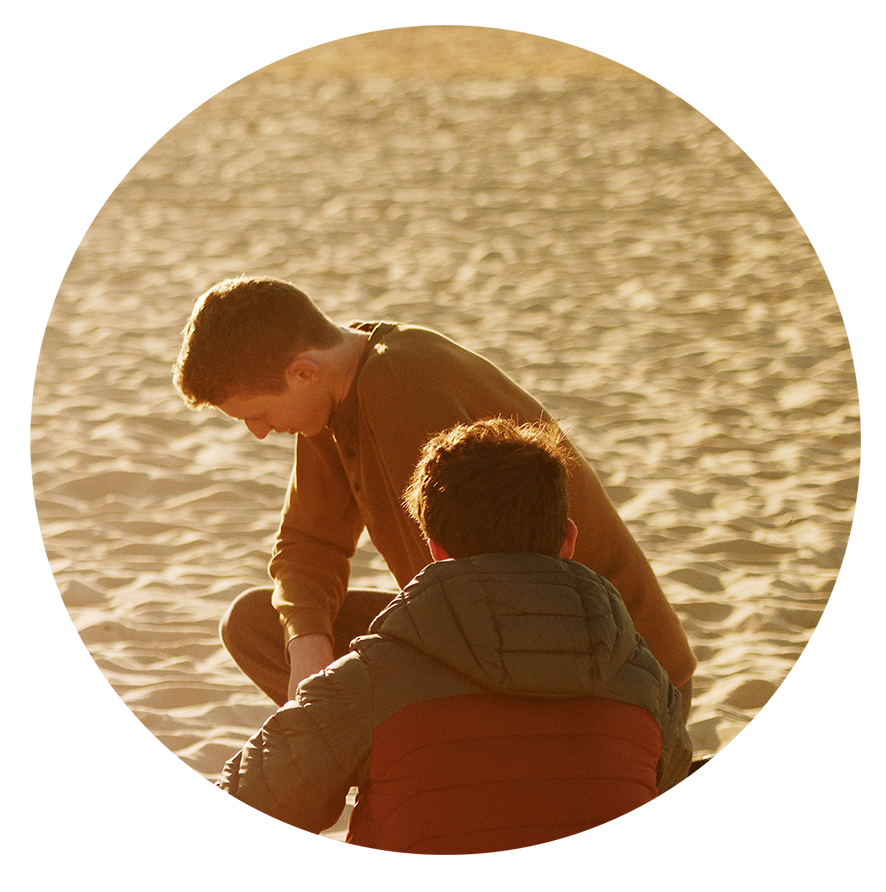 Two teenagers engaged in conversatoin