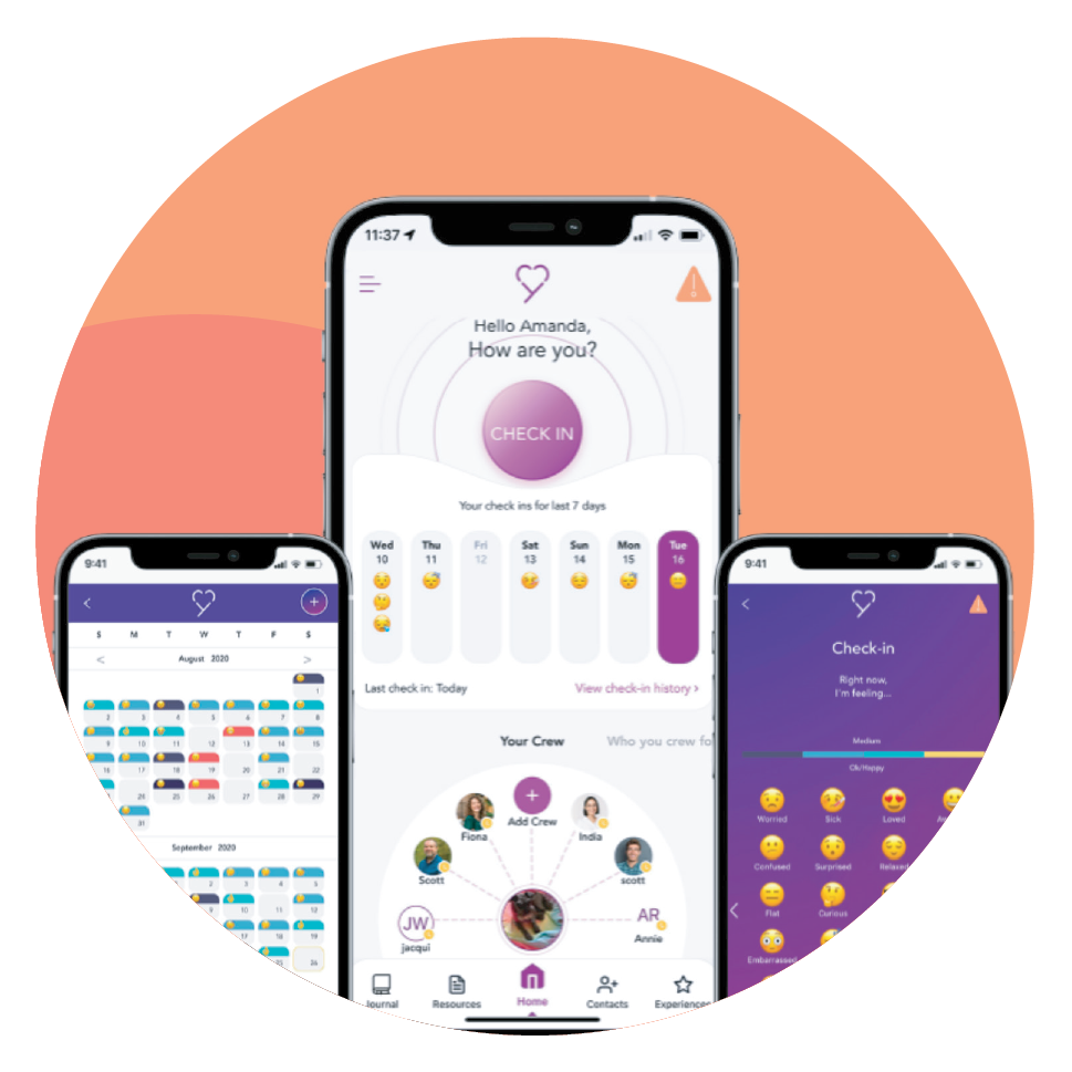 A group of young people laughing together running up a hill